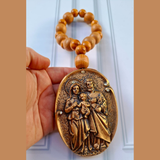 Pingente de porta da Sagrada Família