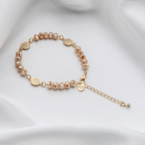 Rosary bracelet with St. Benedict medal.