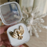 Broche dorado del Espíritu Santo