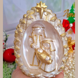 Miniature Nativity Scene in a Golden Pine Cone