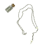 Rosario de perlas con frasco de vidrio